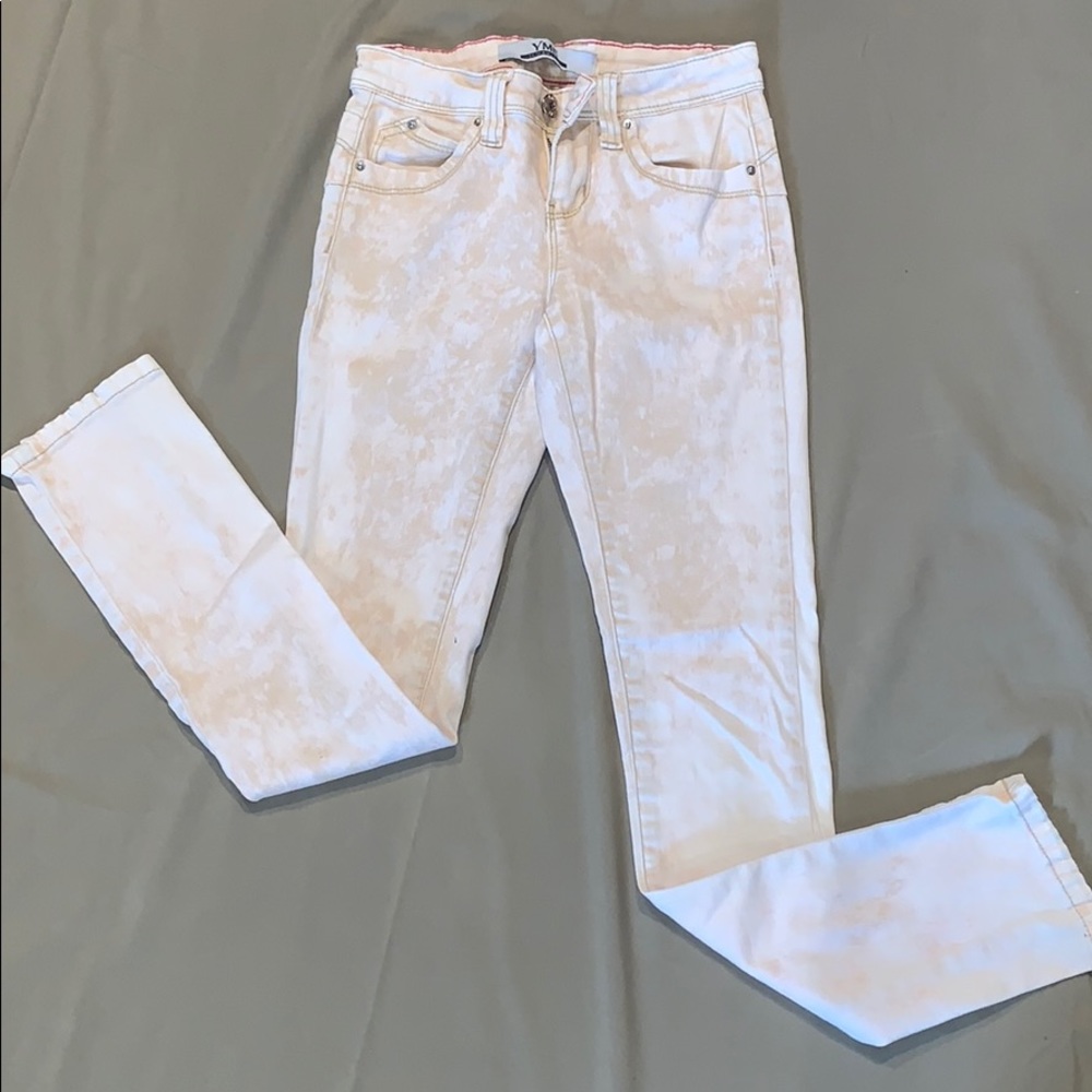 Skinny Jeans. Cream color with a Pink tint.